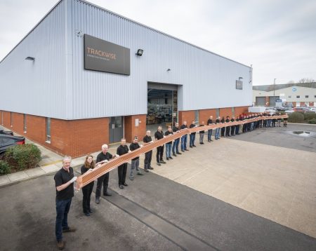 Trackwise staff show the 26m-long flexible PCB for a UAV